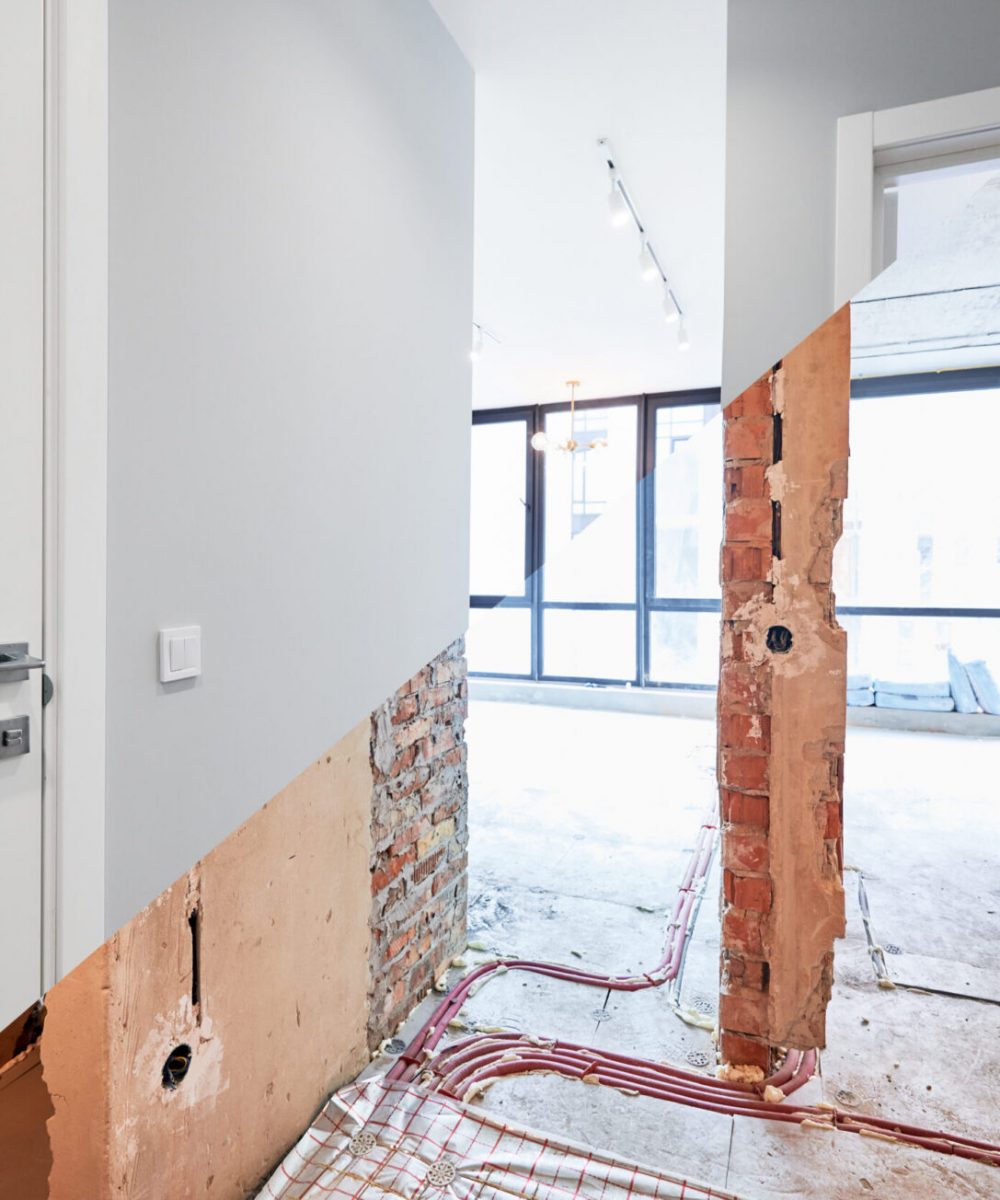 Living room and bedroom with large windows and doors before and after refurbishment or restoration. Old apartment before renovation and new renovated flat with parquet floor and furniture.